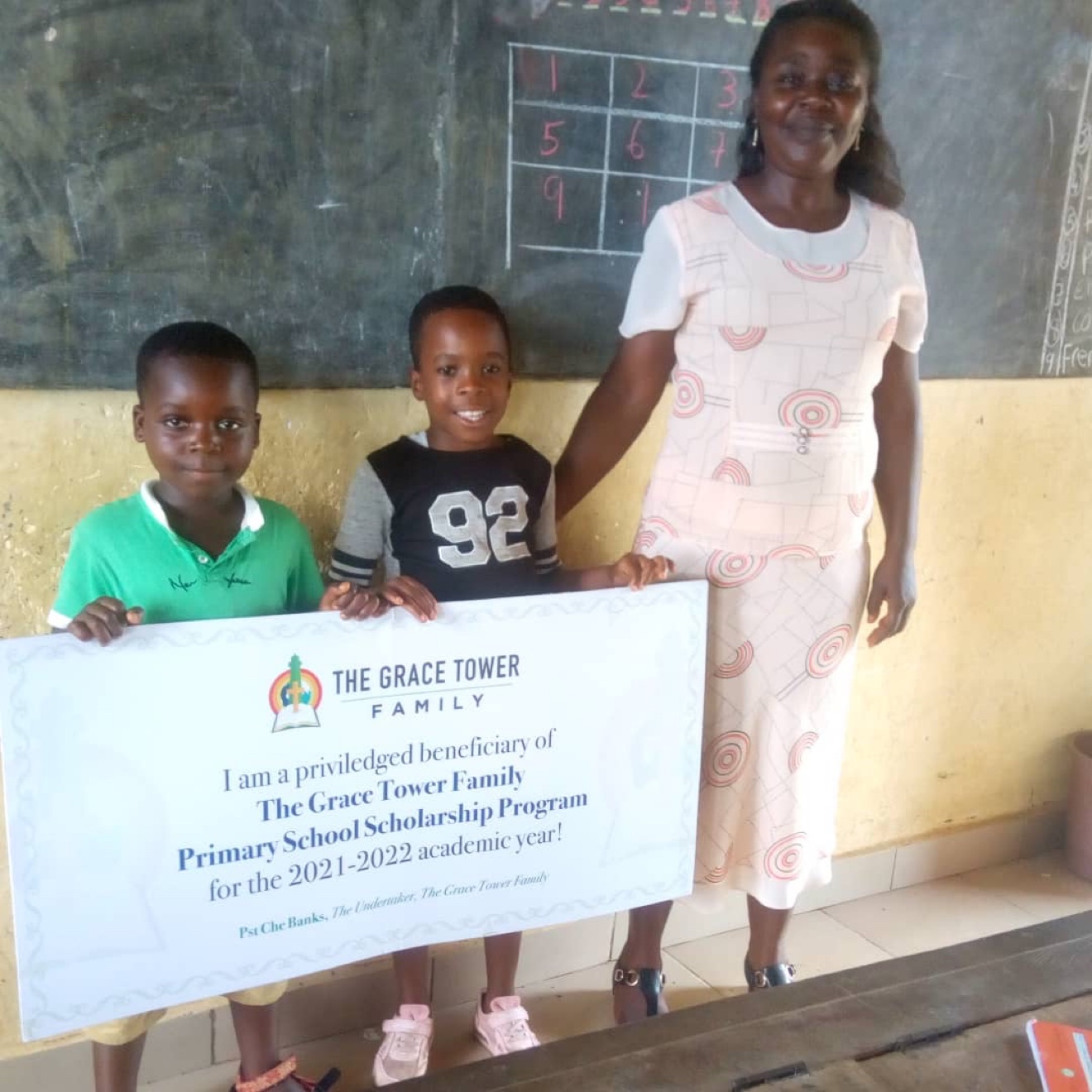 Grace Tower Family scholarship beneficiary with teacher