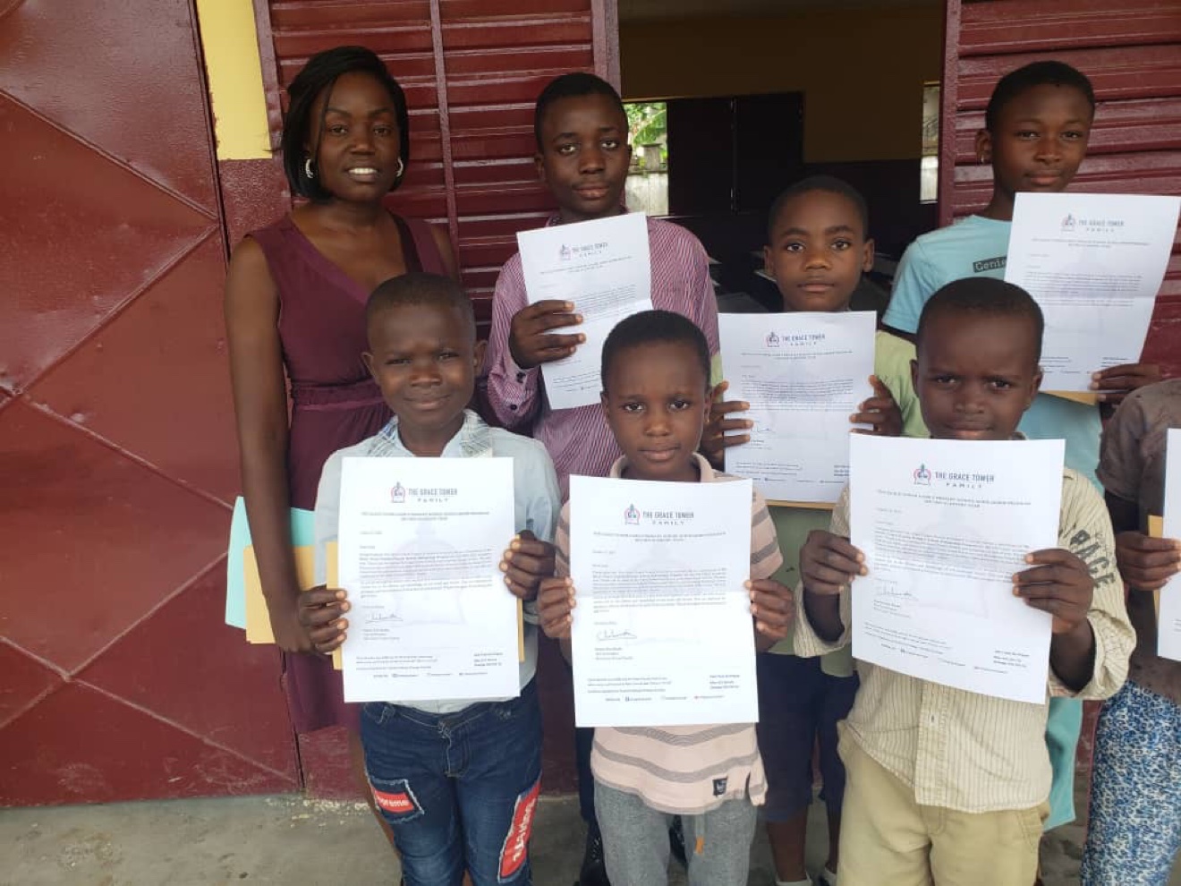 Grace Tower Family scholarship recipients holding award letters