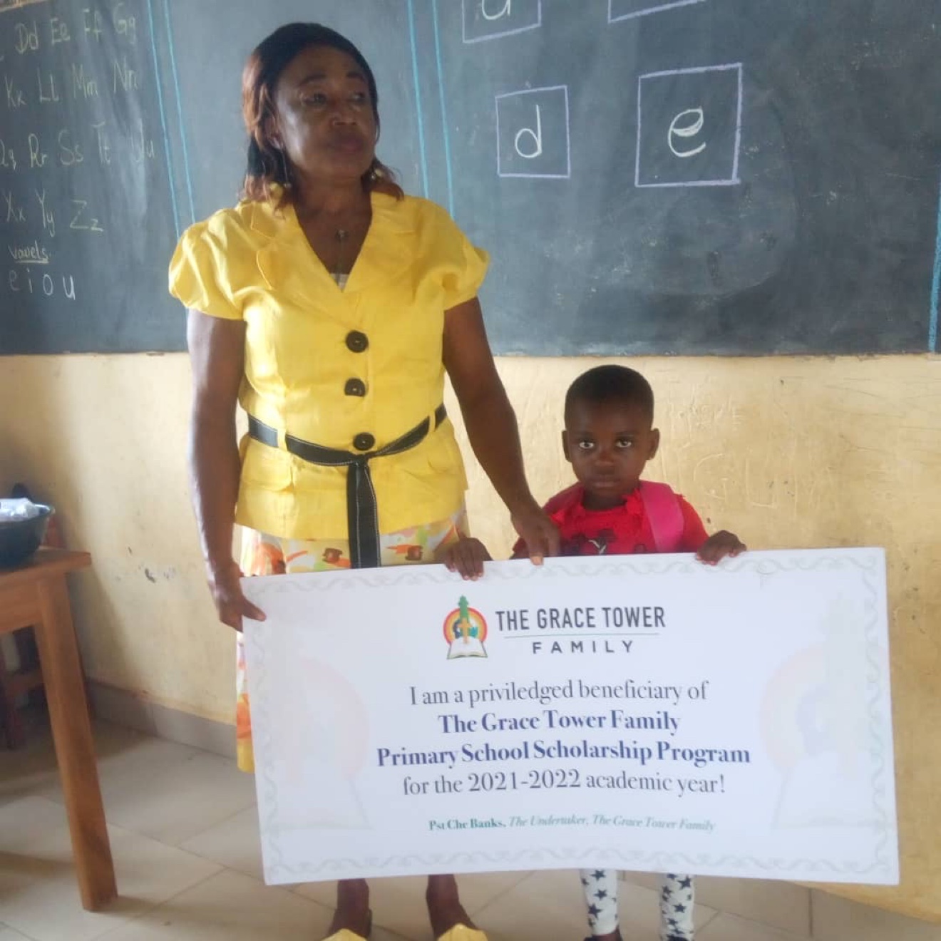 Grace Tower Family scholarship beneficiary with teacher